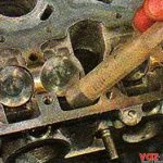 Use a medical syringe (a bulb or a clean rag) to remove residual oil from the niches of the cylinder head